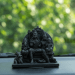 Shiv Parivar Idol car dashboard